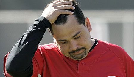 Cincinnati Reds relief pitcher Eddie Guardado faces an uphill battle after Tommy John surgery.
