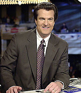 Football analyst Mel Kiper and his finely-tuned pompadour.