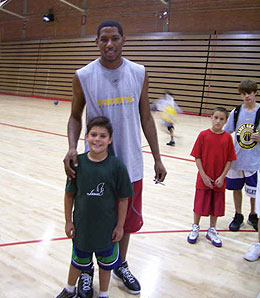 Indiana Pacers swingman Danny Granger poses with Metri, James' son.